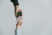 14 Social Media Commenting Tools Compared and Why InstaCOM Wins Modern contactless payment using a card and terminal, highlighting the ease of digital transactions.